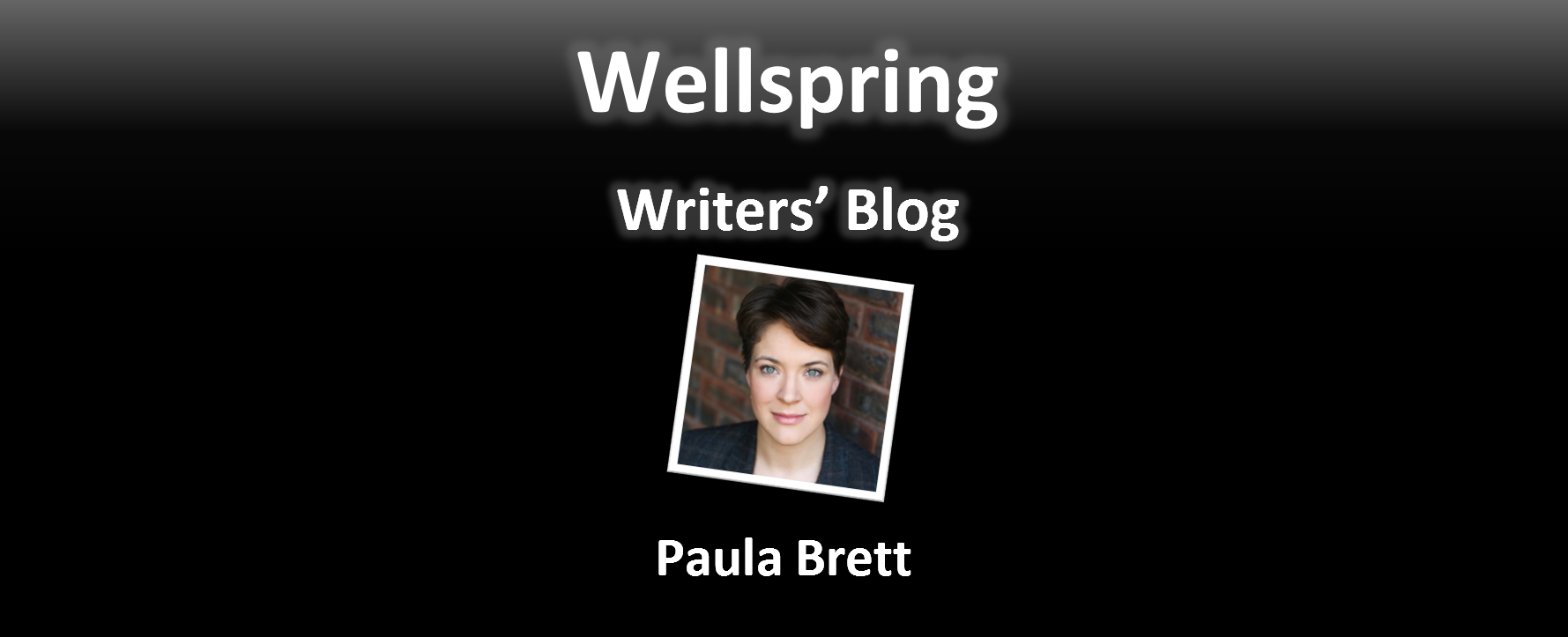 White letters on black background read 'Wellspring Writers' Blog'. Underneath a framed portrait photo of a white person looking directly to the camera. They have green eyes and very short brown hair. Underneath the photo the Paula Brett is written in white letters.